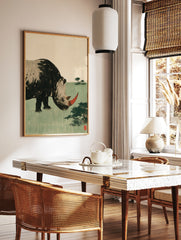 Stylized rhinoceros illustration with red horn and green field background art print, in a styled room mockup