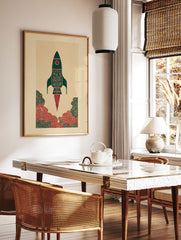 Illustrative rocket art print in green and red with cultural patterns, launching amidst stylized clouds on a beige background. - Image 3