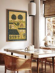 Illustrative rural farm landscape art print with green fields, white sheep, large trees, and a, in a styled room mockup