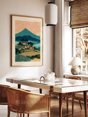 Rural landscape wall art depicting a mountain village with red-roofed houses, green trees, and an orange, swirling sky. - Image 2