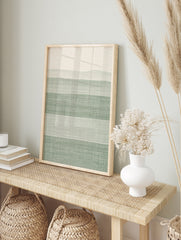 Minimalist abstract wall art print featuring horizontal stripes in sage green and off-white, in an alternate framed mockup