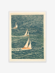 Illustrative sailboat wall art with three boats on a textured blue sea, cream sails, nautical print on satin paper