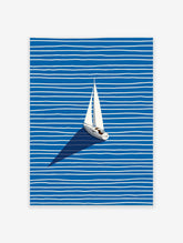 Minimalist sailboat wall art print on blue and white striped water with a dark shadow.