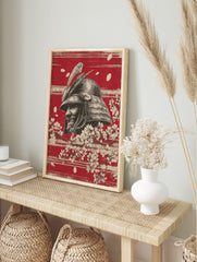 Illustrative samurai helmet in profile with cherry blossoms and petals on a textured red, in an alternate framed mockup