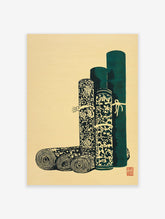 Traditional Asian scroll art print with teal green rolled textiles and intricate patterns on a beige background.