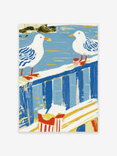 Two white and blue seagulls on a blue railing with a red striped cup and snack box, coastal poster