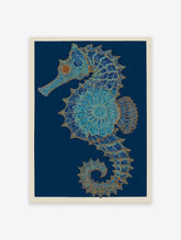Intricate blue and gold seahorse wall art print with mandala patterns on a dark blue background and light border