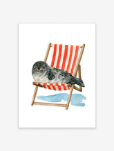 Watercolour illustration of a grey spotted seal sleeping in a red and white striped deck chair on a white background