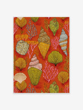 Vibrant seashell wall art print with coral and various shells on a burnt orange background.