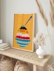 Illustrative wall art print of a layered shaved ice dessert in a striped bowl against a solid, in an alternate framed mockup
