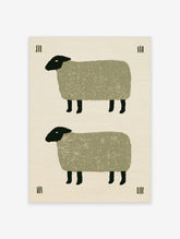 Minimalist folk art print featuring two stacked sheep with textured green bodies and black heads on a cream background