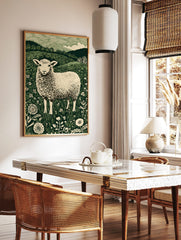 Illustrative green and white sheep in a field of flowers with hills and trees in background, in a styled room mockup