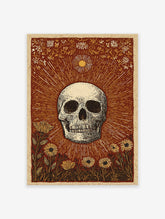 Skull and Sun poster with botanical illustration in reddish-brown, cream, and yellow, featuring a skull, sun rays, and flowers.