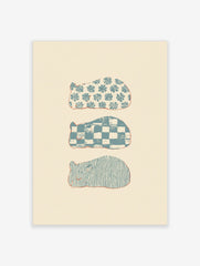 Three stylised sleeping animal shapes with blue floral, checkerboard, and wavy patterns on a cream background