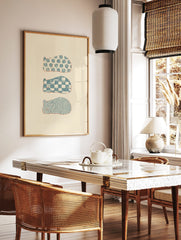 Three stylised sleeping animal shapes with blue floral, checkerboard, and wavy patterns on a cream, in a styled room mockup