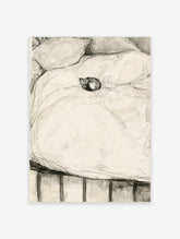 Charcoal sketch of a sleeping cat curled on a rumpled bed with pillows and loose linework