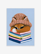 Sleeping fox illustration wearing a knitted hat, curled up on a colourful stack of books, illustrative wall art print