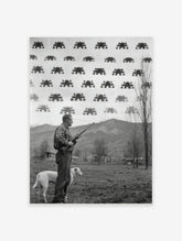 Monochrome print of pixelated Space Invaders aliens over a man with a rifle and his dog in a rural landscape