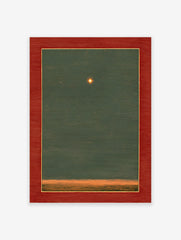 Framed star art print with a glowing star in a dark green sky above an orange horizon, featuring a red mat.
