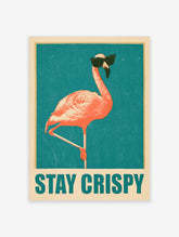 Pink flamingo with black sunglasses and teal Stay Crispy text on teal retro poster