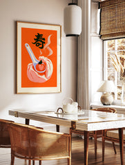 Steamed bun with peach on a spoon illustration, featuring the kanji for longevity, on a bold orange, in a styled room mockup