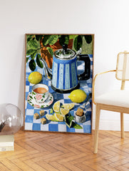 Still life painting of a blue striped teapot, floral teacup, and fresh lemons on a blue and white checkered tablecloth. - Image 2
