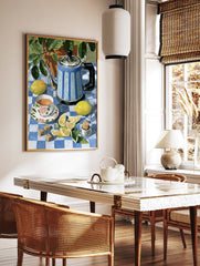 Still life painting of a blue striped teapot, floral teacup, and fresh lemons on a blue and white checkered tablecloth. - Image 3