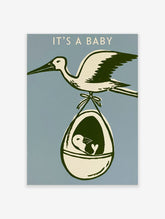 Retro stork poster with white bird carrying egg basket and baby bird, IT'S A BABY text on blue background
