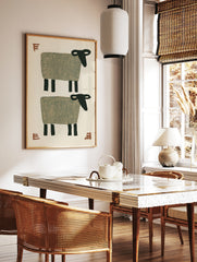 Stylised minimalist sheep wall art with two grey sheep and terracotta typographic accents on a, in a styled room mockup