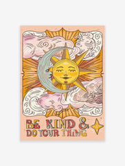 Celestial sun and moon wall art with 'Be Kind & Do Your Thing' text and clouds on a peach background