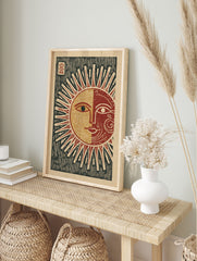Stylized Sun Moon Wall Art print with a split face in red, gold, and dark green, on a light paper background. - Image 3