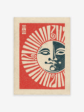 Sun Moon wall art print with a half light, half dark face on a red background with celestial rays and Japanese characters.