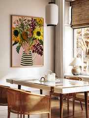 Illustrative sunflower and pink floral bouquet in a striped jug on a pink background, botanical, in a styled room mockup