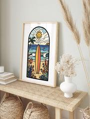 Illustrative beach scene art print with a yellow and orange surfboard, palm tree, smiling, in an alternate framed mockup
