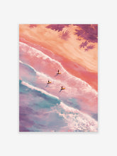 Aerial view poster of three surfers on surfboards in pastel pink and blue ocean waves with sandy beach and palm trees.