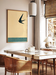 Japanese style art print featuring a black swallow flying against a yellow sky above a teal patterned band. - Image 2