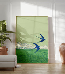 Two blue swallows flying over a green field with distant mountains, in a Japanese-inspired illustration style art print. - Image 3