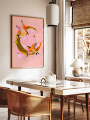 Abstract swallow bird illustration flying around a golden crescent moon on a pink background art, in a styled room mockup