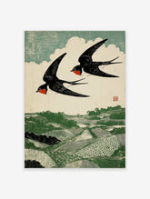 Woodcut print of two black and red swallows flying over a green rolling landscape with fields and trees