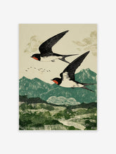 Two black and white swallows with red markings flying over green mountains in a woodblock print style