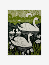 Green and white linocut-style print of two swans and two cygnets swimming in a lake with water lilies