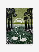 Linocut-style print of two white swans on a dark green lake, framed by tall black trees and a white rising sun