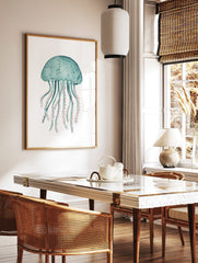 Teal watercolour jellyfish illustration art print with coral pink tentacles on a white background, in a styled room mockup