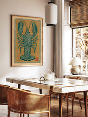 Teal lobster illustration with ornate patterns, centered on a beige background with a decorative, in a styled room mockup