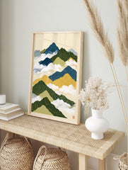 Illustrative mountain landscape with circuit board patterns in blue, green, and yellow, on a, in an alternate framed mockup
