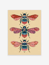 Three stylized bees with pink and blue patterned bodies and wings on beige background, illustrated wall art print