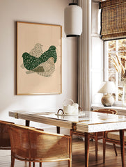 Illustrative wall art print with three stylised birds in dark green and beige, showing various, in a styled room mockup