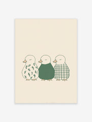 Illustration of three ducklings in a row, with floral, solid green, and plaid patterns on a beige background
