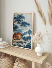Japanese art poster featuring a tiger resting beside blue waves and a pine tree on a light background. - Image 4