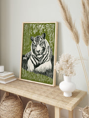 White tiger with black stripes resting in green jungle foliage, lino print style wall art, in an alternate framed mockup